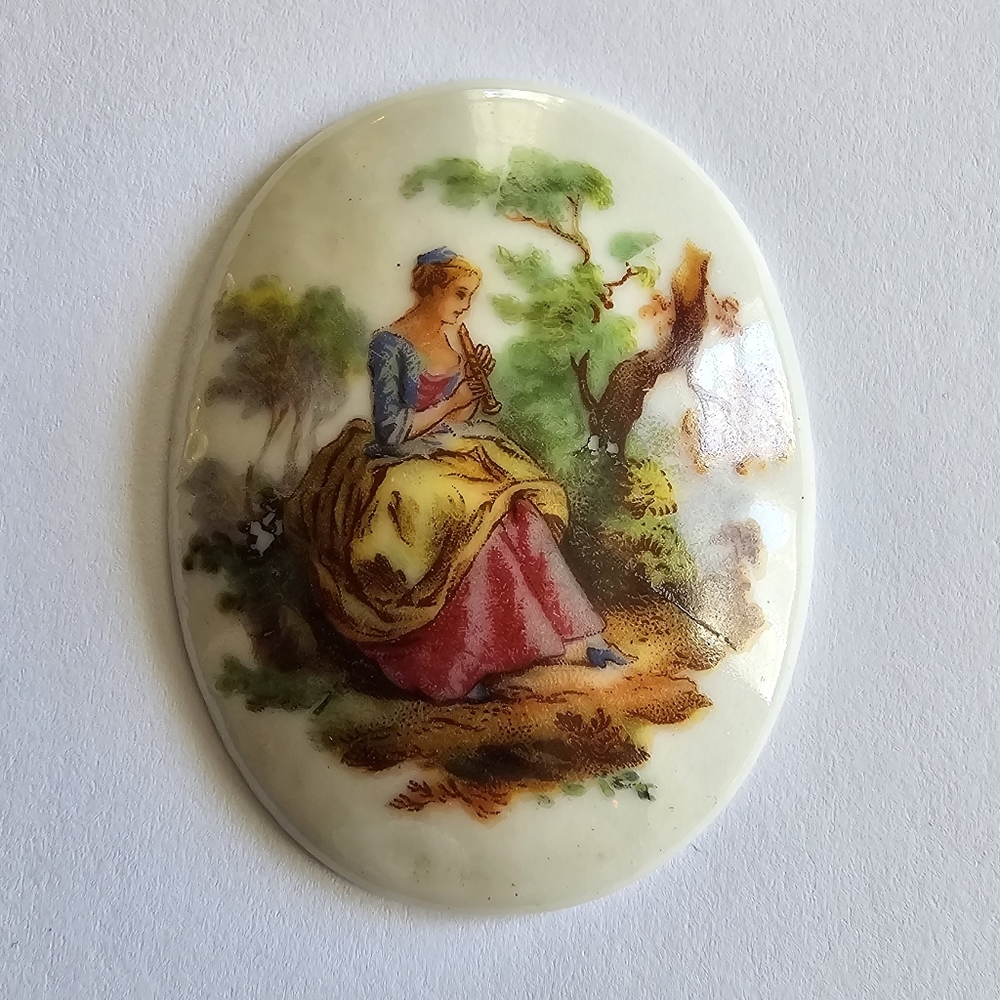 Vintage cabochon with pastoral scene woman sitting porcelain oval